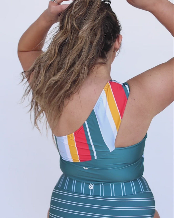 Atlantic Stripe Classic Midrise Bottom Sizing Video. Plus sized women modeling  blue and white striped swimsuit bottoms.