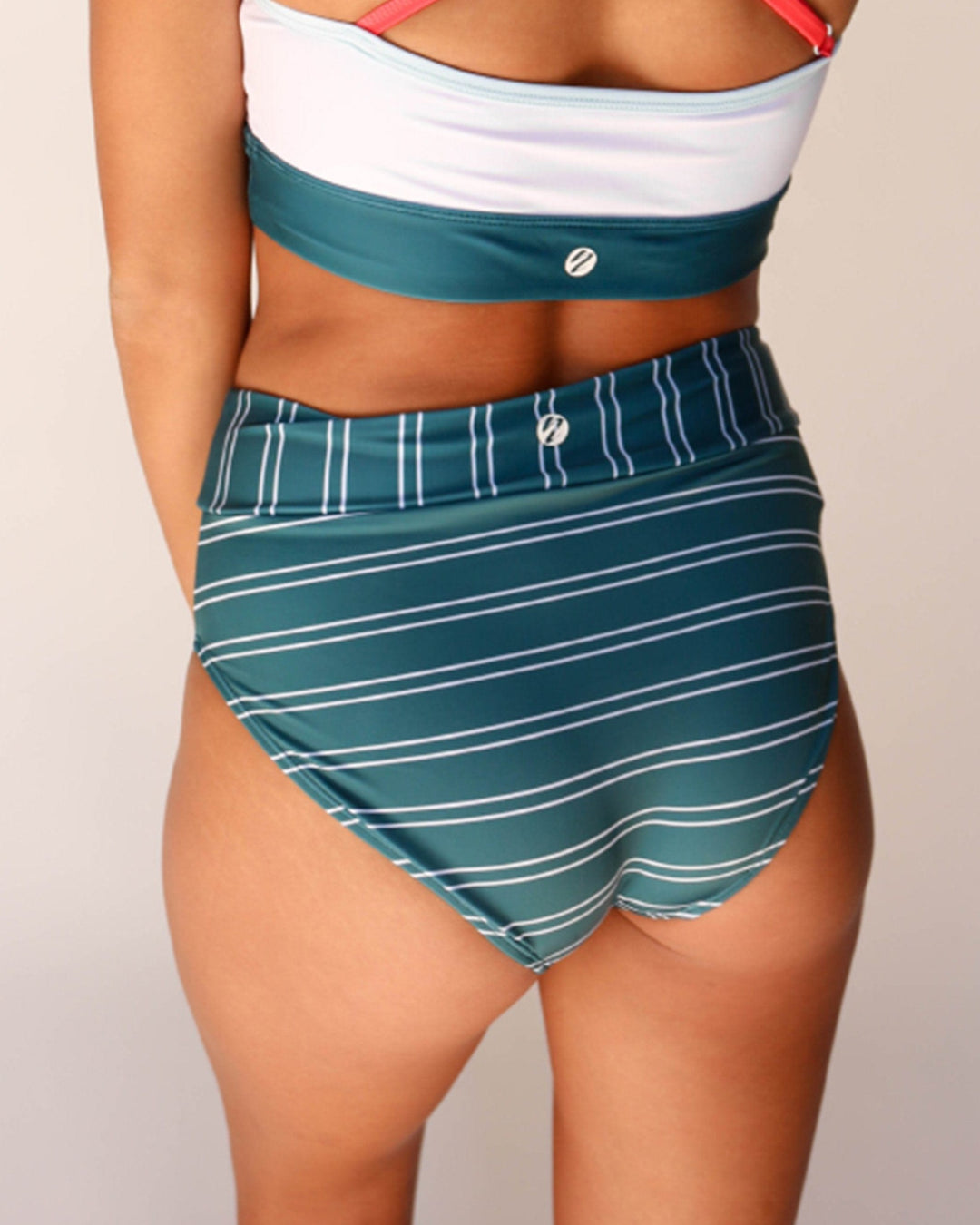 Studio images of the back view of  blue and white striped swimsuit bottoms.
